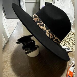 Black flat brim hat with cheetah print band